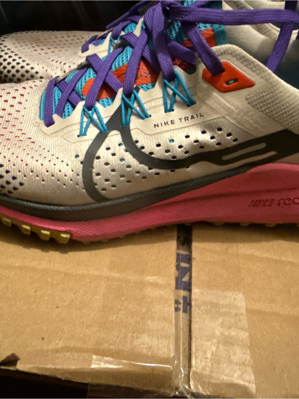 Nike Women's Trail Running Shoes in Cream with Pink & Purple Accents